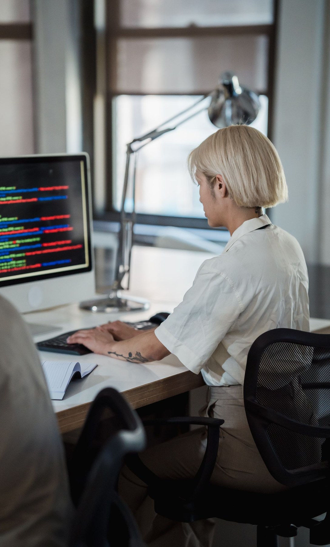 Software developer working on code